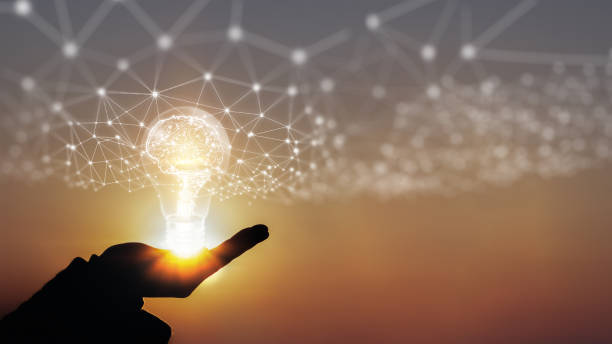 Hand of businessman holding illuminated light bulb, New ideas, innovation and inspiration concepts