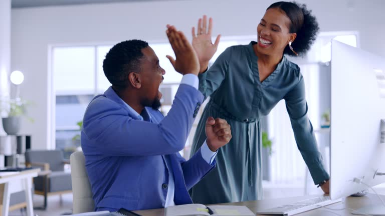Winner, success or happy black people high five in celebration of business deal or startup project. Teamwork, support or excited employees celebrate winning a bonus, target achievement or sales goals