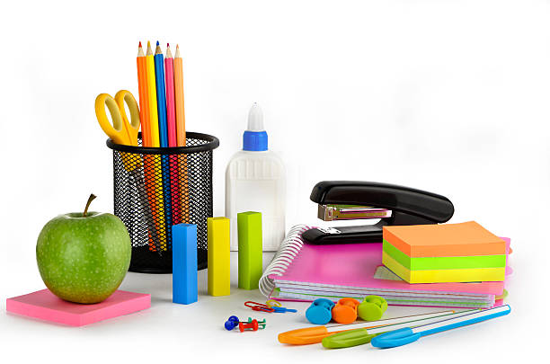 Stationery set on a white background with green apple