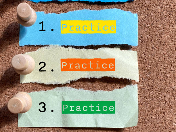 Repetition of practice words notice on board background. Stock photo.