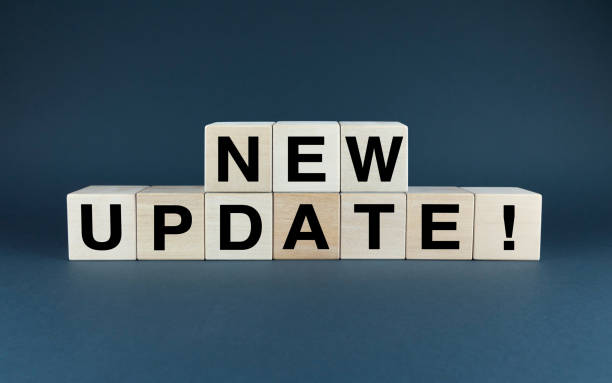 A minimalist composition featuring wooden blocks spelling out the word NEW UPDATE. The image is a simple yet effective way to convey the message of new information or a product update