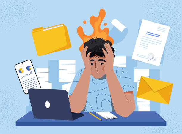 Frustrated man with flaming head surrounded by laptop, documents, and phone, symbolizing work stress. Modern flat style on blue background. Vector illustration