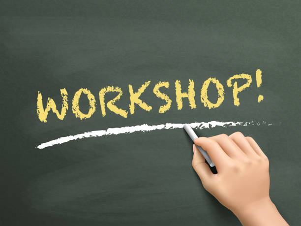 workshop word written by hand over chalkboard