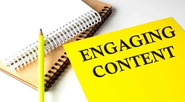 ENGAGING CONTENT text written on yellow paper with notebook